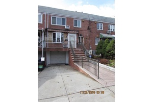Two family attached, solid brick, on a beautiful street close to Juniper Valley Park.