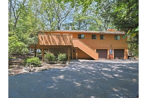 This home offers four bedrooms amp ; two full bathrooms, with an open concept living and dining area highlighted by vaulted ceilings.