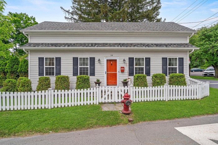 Welcome to 14 Forester Ave — this charming, updated Colonial is nestled in the heart of Warwick village, featuring classic curb appeal and a beautiful