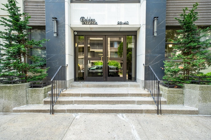 View of exterior entry featuring french doors
