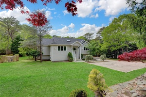 Welcome to this fully renovated, privately gated home located in the highly sought after Red Creek Ridge community, just minutes from the beach.