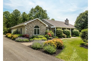Nestled amidst the serenity of the Clermont countryside, this one of a kind, custom built luxury ranch home presents a perfect blend of sophistication and comfort, designed with the modern ...