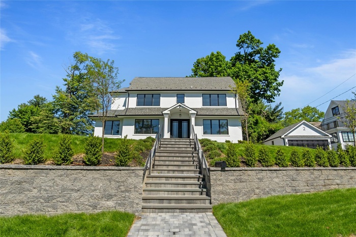 View of front of home with stucco siding