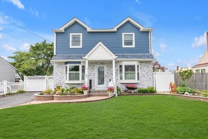Welcome to 1015 Grand Blvd, a beautifully maintained and thoughtfully updated Colonial located in the highly desirable Salisbury section of Westbury, within the East Meadow School District.