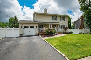 Wonderful Colonial set on manicured park like grounds offers Living Room w Gas Fireplace, Formal Dining Room for entertaining, hardwood floors throughout !
