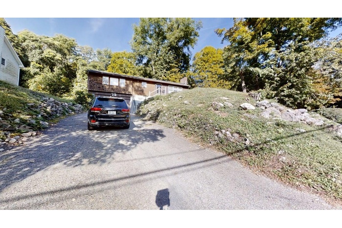 View of front of home with concrete driveway