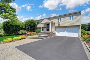 Welcome to this beautifully maintained 4 bedroom, 2.