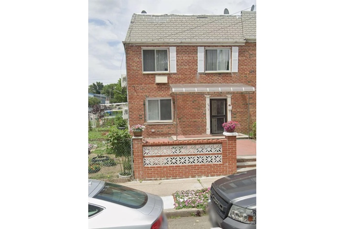 View of front facade with brick siding