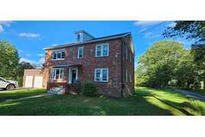 Country Duplex ! This 2 story brick home features a main level apartment that has recently been renovated and features a sunny living room, a dining area and open kitchen ...