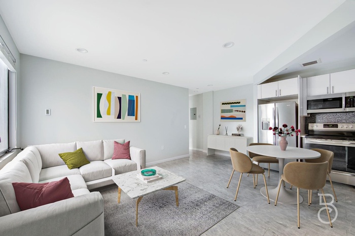 Living room featuring baseboards