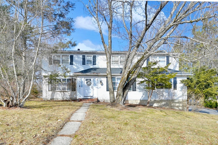 View of front of house with a front yard