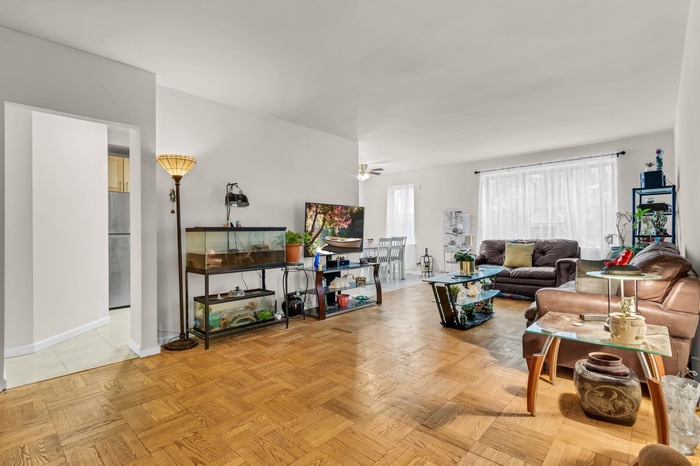 Living area featuring baseboards