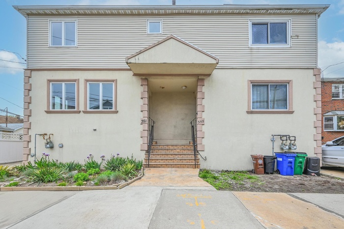 Multi unit property featuring stucco siding