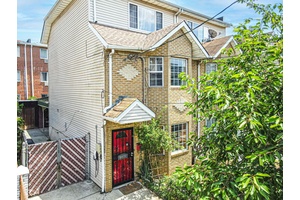 Step into modern living with this beautifully maintained, updated three story home in the heart of Kew Gardens !