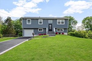 Welcome to this impeccably renovated home located in the heart of Dix Hills, offering the perfect blend of modern comfort and timeless appeal.