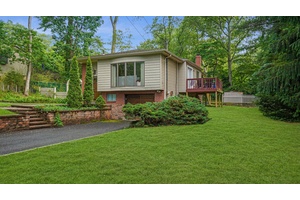 Immaculate 3 bedroom, 2 bath Hi Ranch in the desirable Smithtown School District featuring hardwood floors throughout and a beautifully updated kitchen with granite countertops, stainless steel appliances, and a ...