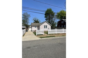 Totally Redone 3 bedroom 2 full bathrooms Living Room, Dining Area, Kitchen, Full Finished Basement, private driveway, 1 detached garage.
