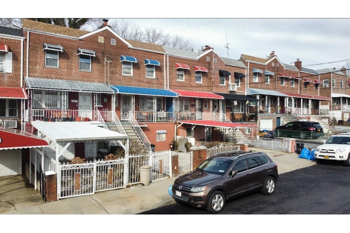 View of building exterior with a residential view