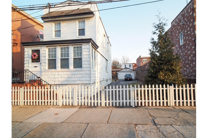 View of front of house with a fenced front yard
