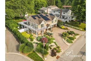 Tucked away in one of the North Shore s most coveted enclaves, 50 Ships Point Lane presents an unparalleled opportunity to own a waterfront home with private mooring rights, resort ...