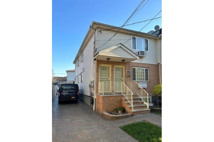 View of front of home featuring driveway