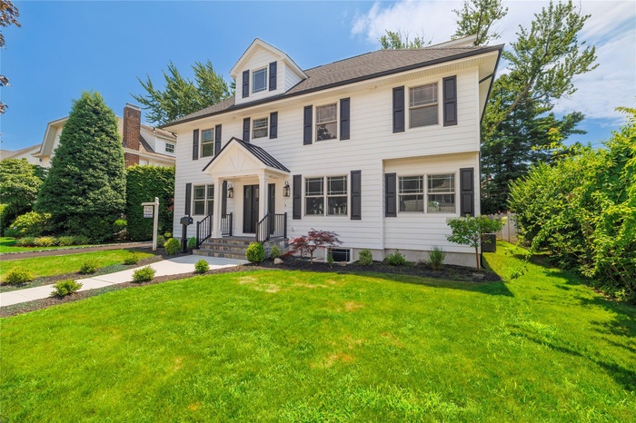 View of front of home with a front yard