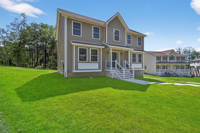 View of front of home with a front yard