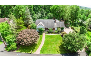 One of a kind Custom Cape Cod style home, expanded and updated, lovingly maintained and cared for the past 50 years by the same family.