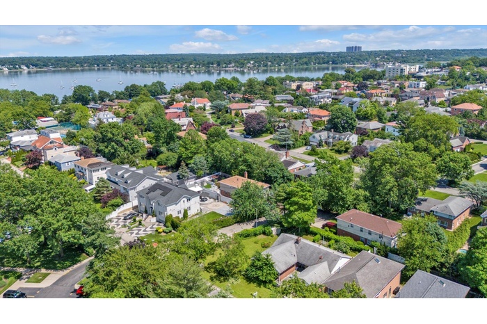 Aerial view of property and surrounding area with nearby suburban area and  nearby the water Little Neck Bay & Bay Side Marina.