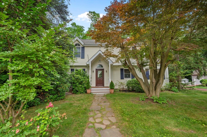 Nestled on a treed neighborhoodstreet a few blocks South of 25A