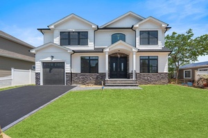 Completed New Construction home on a stunning mid block location in east meadow.