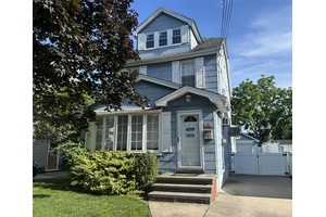 Welcome to this Beautifully maintained 3 Bedroom, 2 Bathroom Expanded Chatlos Colonial in the Village of Williston Park.