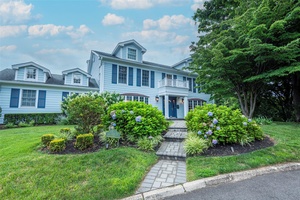 Welcome to this immaculate 6 bedroom, 4.