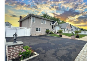 Welcome Home to waterfront living at its finest in this beautifully remodeled split level home, ideally situated in Amity Harbor.