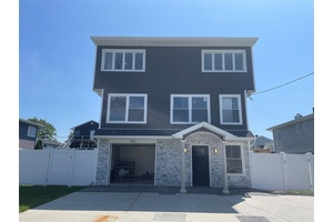 Experience The Epitome Of Coastal Living In This Sun Drenched New Construction FEMA Compliant 5 Bedroom 3 Bath Home On The Water With New Bulkheading To Enjoy Spectacular Views And ...