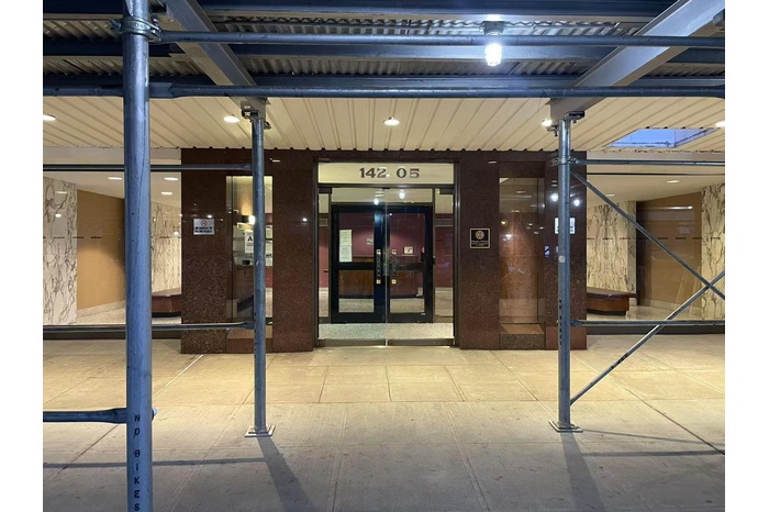 Property entrance featuring elevator