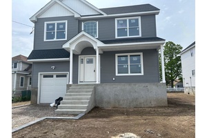 A newly constructed colonial waterfront residence is available in Baldwin Harbor.