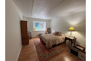 Welcome to this beautifully maintained one bedroom, one bathroom condo at Halston House featuring a spacious and open living room, perfect for relaxing or entertaining.