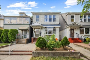Welcome to this fully detached Colonial style legal two family home, offering a spacious and versatile layout ideal for both end users and investors.