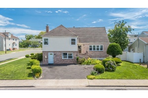 Welcome to 205 Saint Marks Avenue, a lovely single family home located on a quiet residential block in vibrant Freeport.