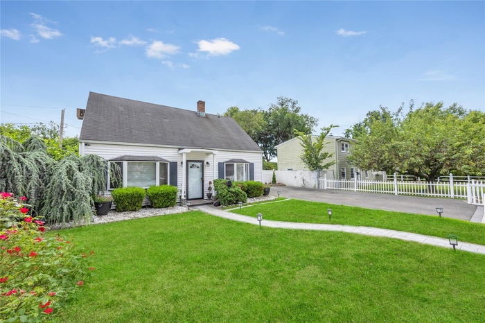 Cape cod home with a chimney