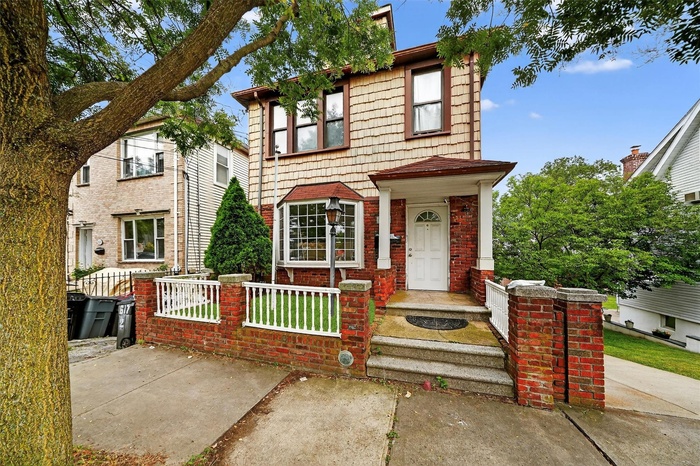 View of front of home with brick siding
