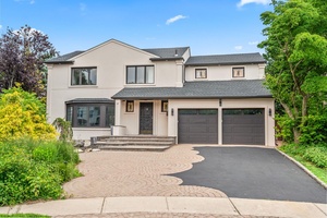 Look no further this beautifully renovated gem in the desirable Suburban Woods section of Manhasset Hills offers the best of luxury living.