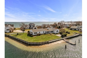 Perfectly positioned on the water with its own private dock, this home is a dream for boating enthusiasts and nature lovers alike.
