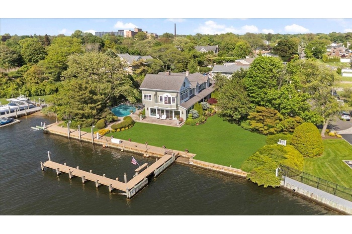 View from above of property with a large body of water