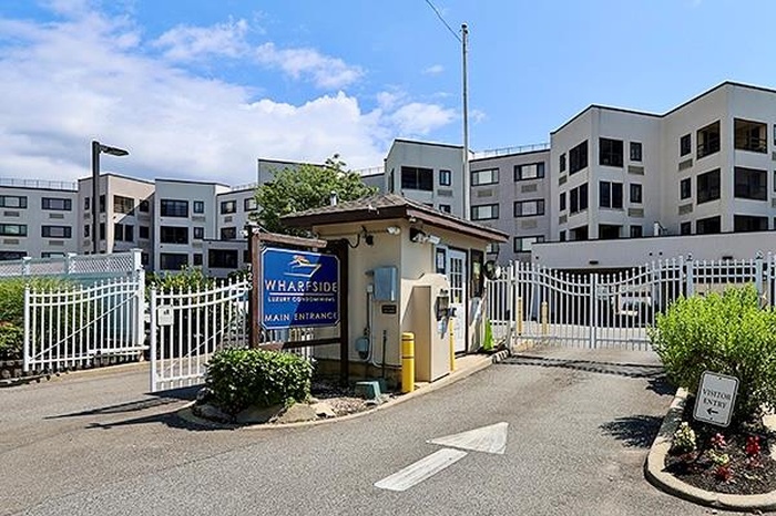 gated entry, a gate, and curbs
