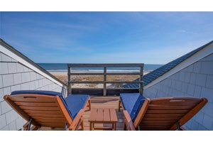 Ocean Escape Your Private Oasis and View of the Sea Step onto your private boardwalk, where the scent of salt air fills your lungs, and the soft whisper of the ...