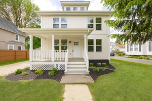 Tastefully updated Village of Millerton colonial loaded with attractive finishes.