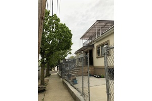 Fantastic 2 Family Corner Property with Private Driveway amp ; Garage !