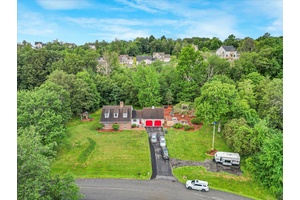 This charming Cape Cod style single family home blends traditional character with suburban comforts.
